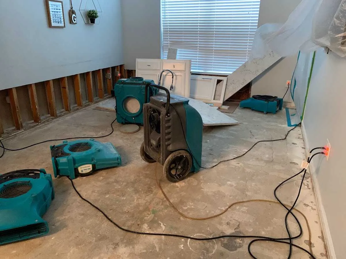 Dehumidifier in flood-cut room for Water Damage Restoration in Winterville